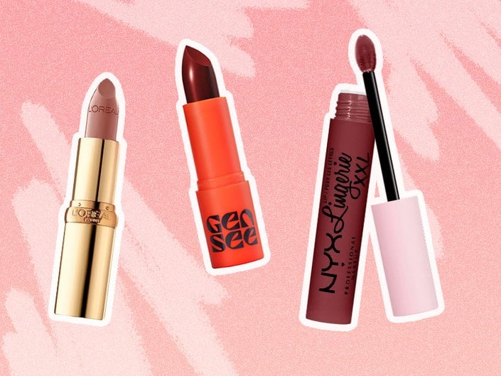 colorful loreal paris lipsticks photographed on a red background