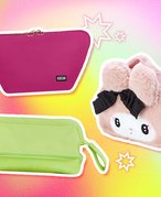 Picture of three makeup bags on colorful graphic background