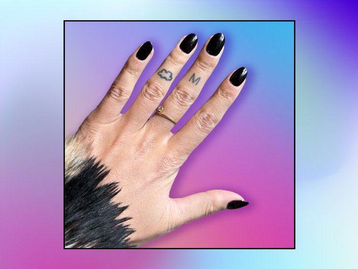 Person's hand with nails painted black, collaged on a purple and blue graphic background