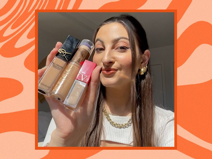 alanna holding up her favorite concealers with skin benefits from ysl beauty, valentino beauty and urban decay