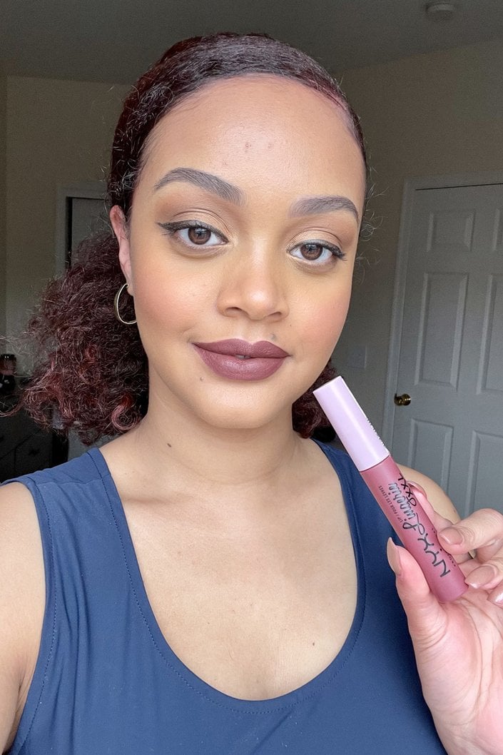 person wearing nyx professional makeup lip lingerie xxl matte liquid lipstick in straps off