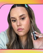 reece holding the loreal paris brow mascara