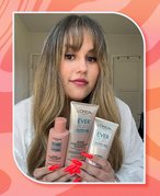 Pink and orange collage with person holding the L’Oréal Paris EverPure Bonding System.