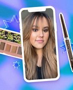 Photo of editor on a blue and purple background with the Urban Decay Naked Fox Mini Eyeshadow Palette and the L’Oréal Paris Infallible Grip Gel Eyeliner.