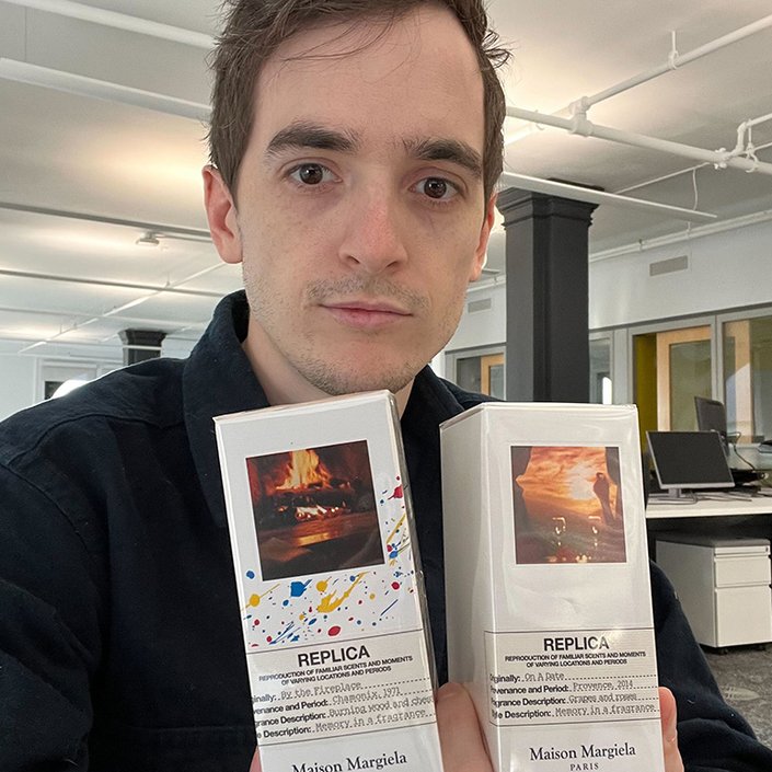 stephen holding two of the maison margiela fragrances